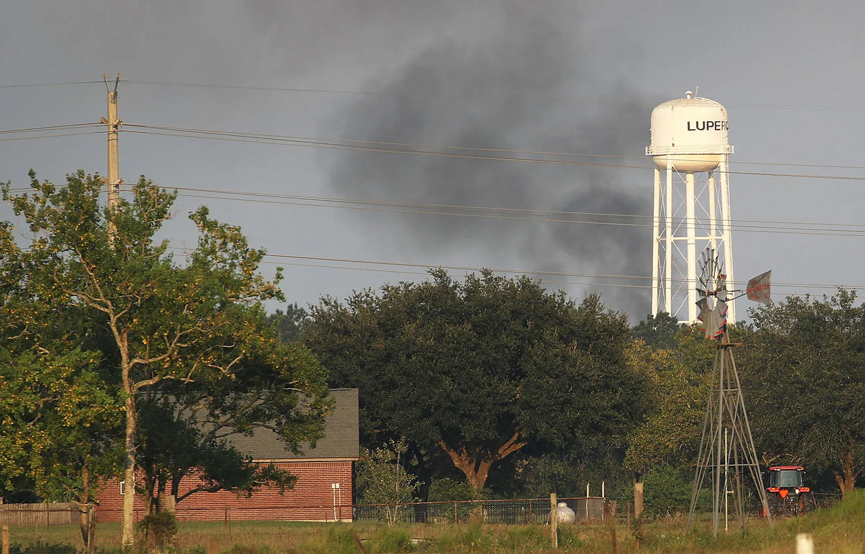 Smoke rises from the Arkema chemical manufacturing and storage facility in Crosby, Texas, on Sept. 1, 2017.
