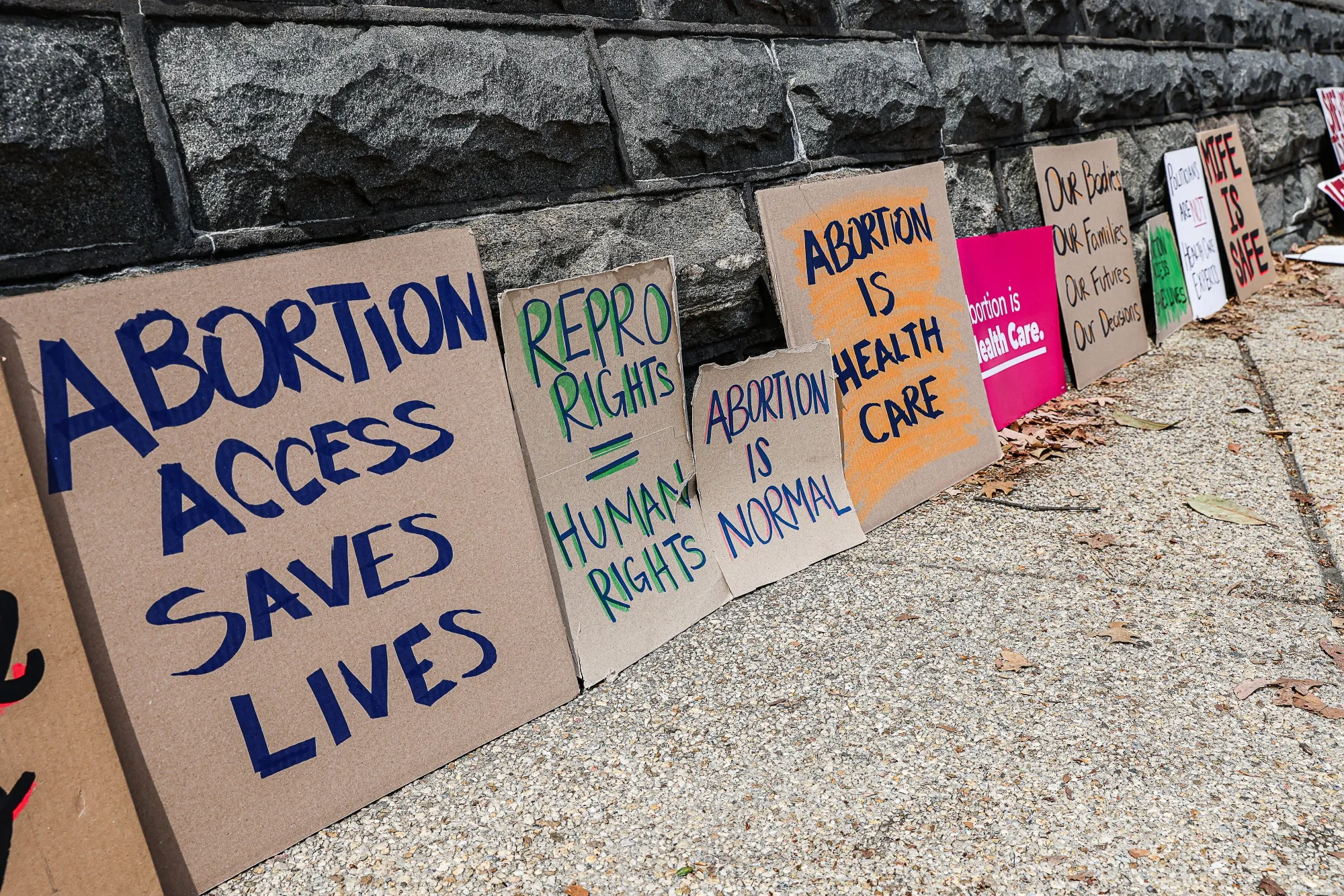 Signs outside the Supreme Court on Tuesday.