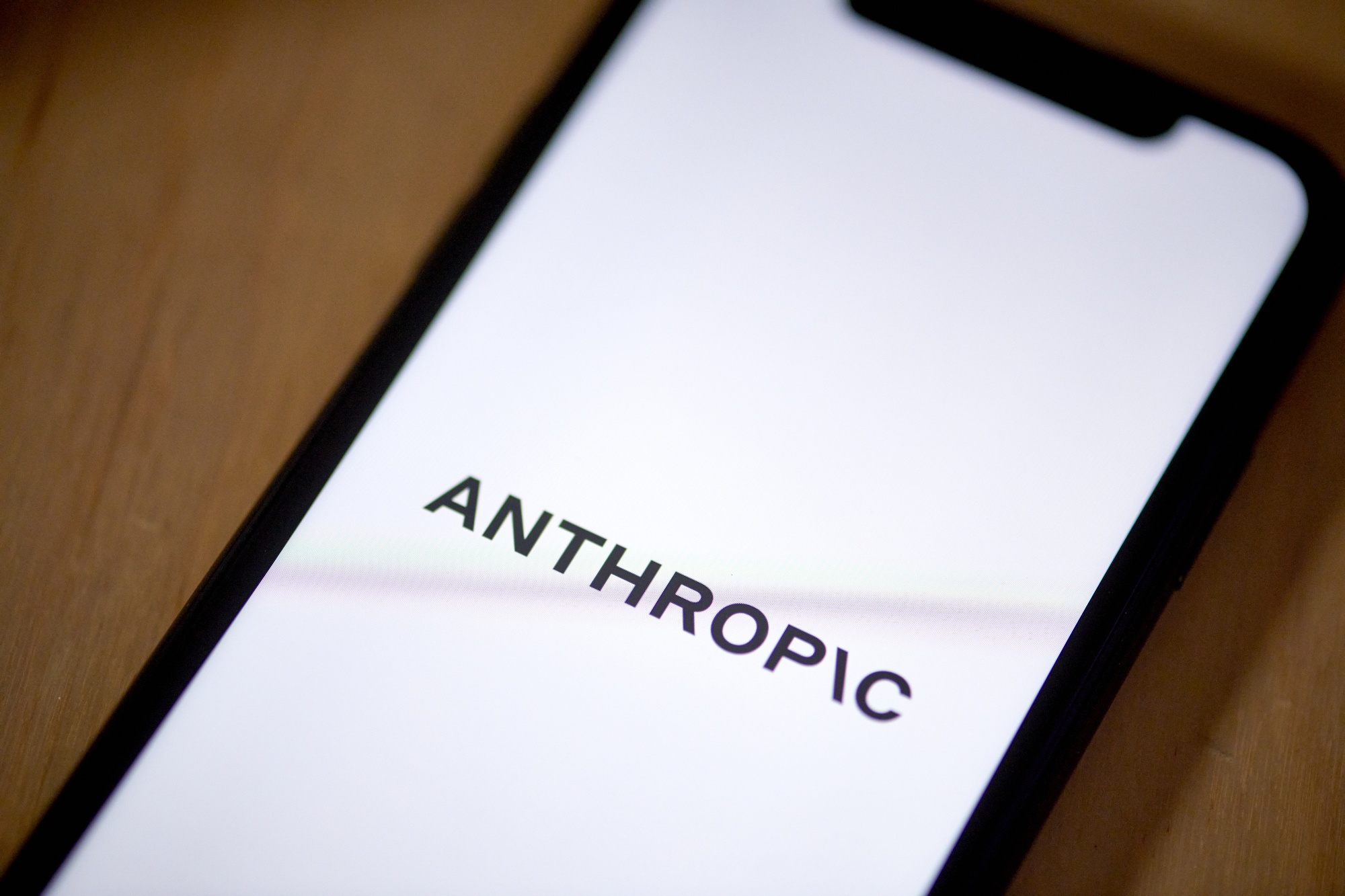 The Anthropic logo on a smartphone arranged in New York, US, on Tuesday, Aug. 15, 2023. Investor enthusiasm for AI-related startups has increased significantly in the past year, as more of the technology has come to market, showcasing its potential. Photographer: Gabby Jones/Bloomberg