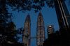 The Petronas Twin Towers, left and center, stand next to the Menara Maxis building, center right, which houses the country office of Goldman Sachs (Malaysia) Sdn., in Kuala Lumpur, Malaysia, on Tuesday, Dec. 18, 2018. Malaysia is demanding Goldman Sachs Group Inc. bear the brunt of the 1MDB scandal, opening up another legal front for the Wall Street firm over its role raising money for the investment fund.