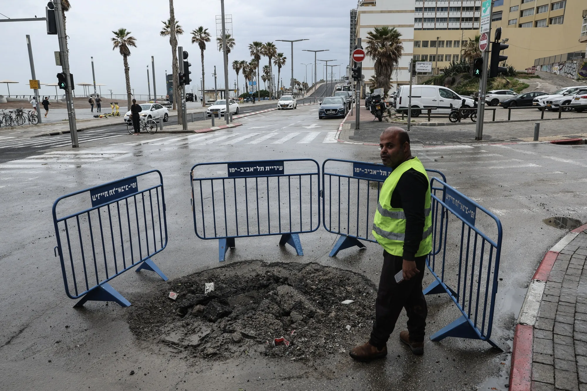 An impact on a street near the French embassy in Tel Aviv following an Iranian strike, on April 1.