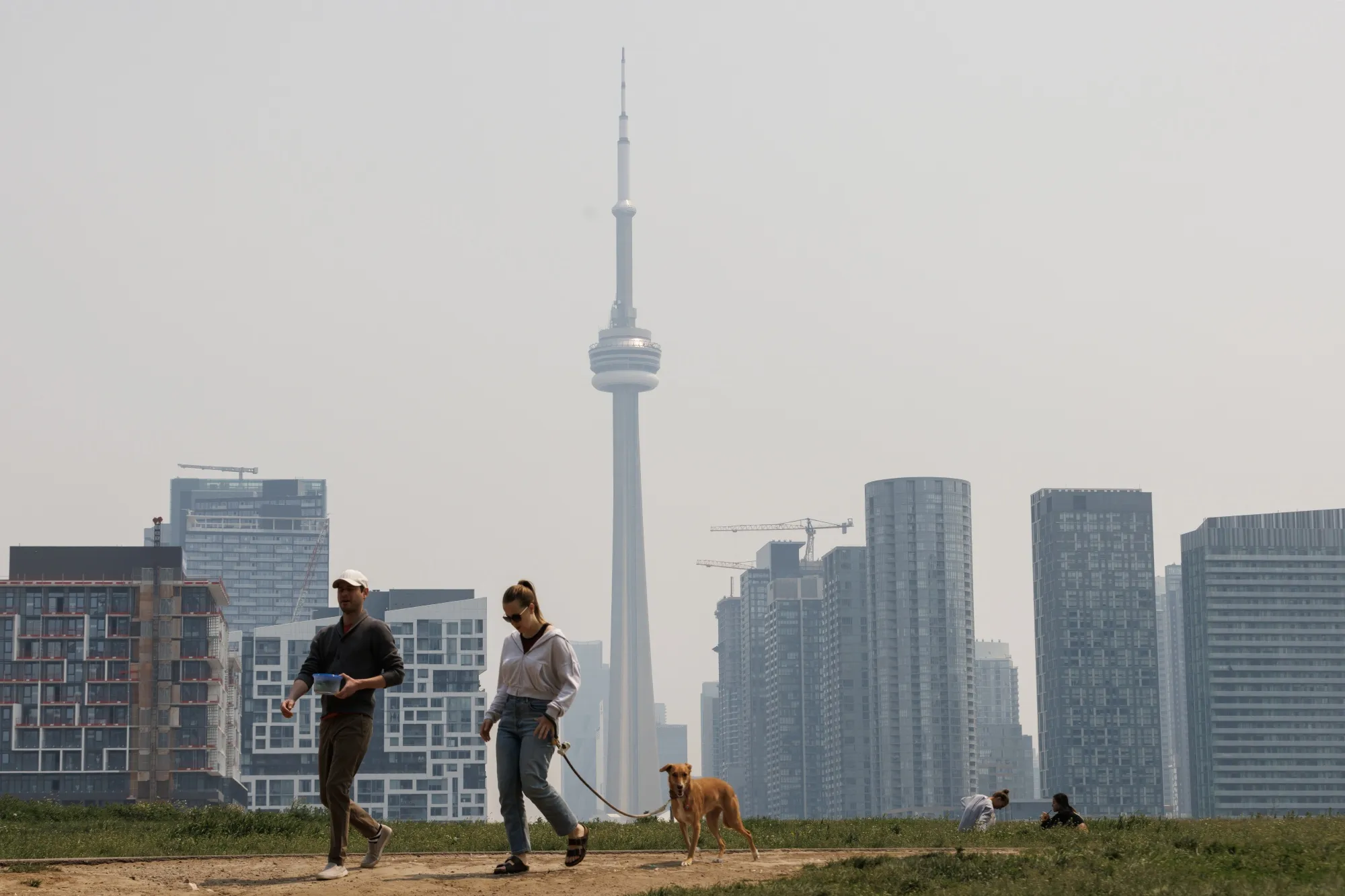 Smoke from wildfires in Toronto&nbsp;on June 7, 2023. Wildfires continue to burn large tracts of forest in Canada, with little sign weather will provide much help to firefighters who are battling the blazes.