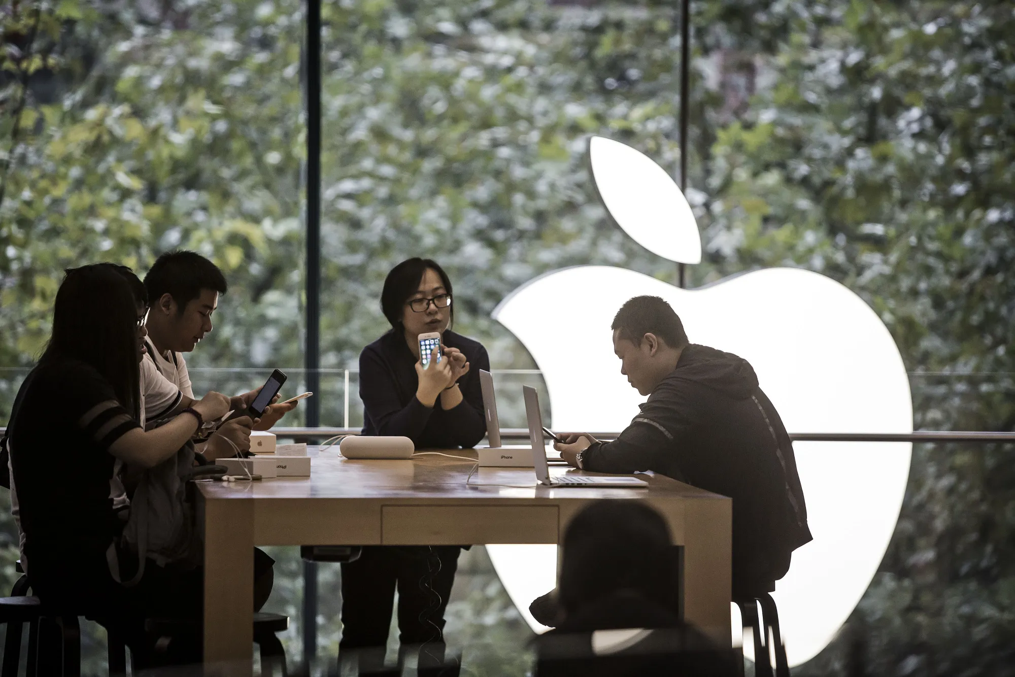 Customers at an Apple Store in Shanghai.&nbsp;