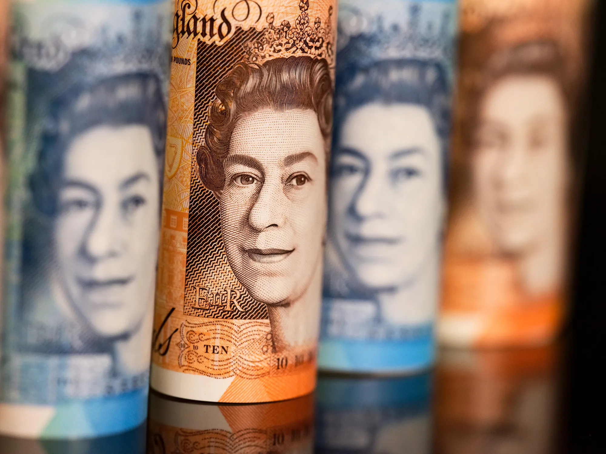 The image of Queen Elizabeth II sits on British 10 and five pound banknotes.