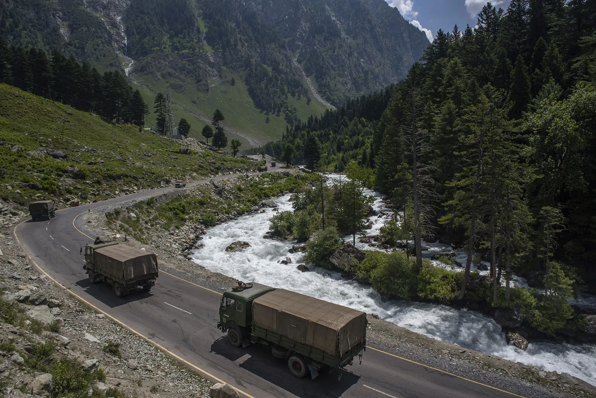 An Indian army convoy drives towards Leh, bordering China in Gagangir, India.&nbsp;