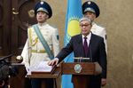 Kazakhstan's Senate chairman Kassym-Jomart Tokayev takes the oath as Kazakh interim president during a ceremony in Astana on March 20, 2019. (Photo by STR / AFP)        (Photo credit should read STR/AFP/Getty Images)