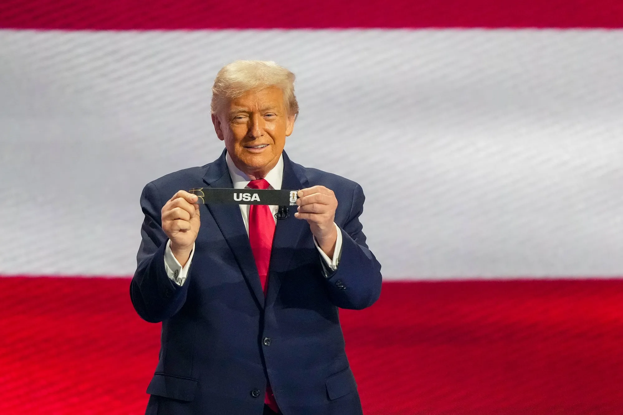 President Donald Trump, at the World Cup draw today, plans to hit the road next week to talk up his economic agenda
