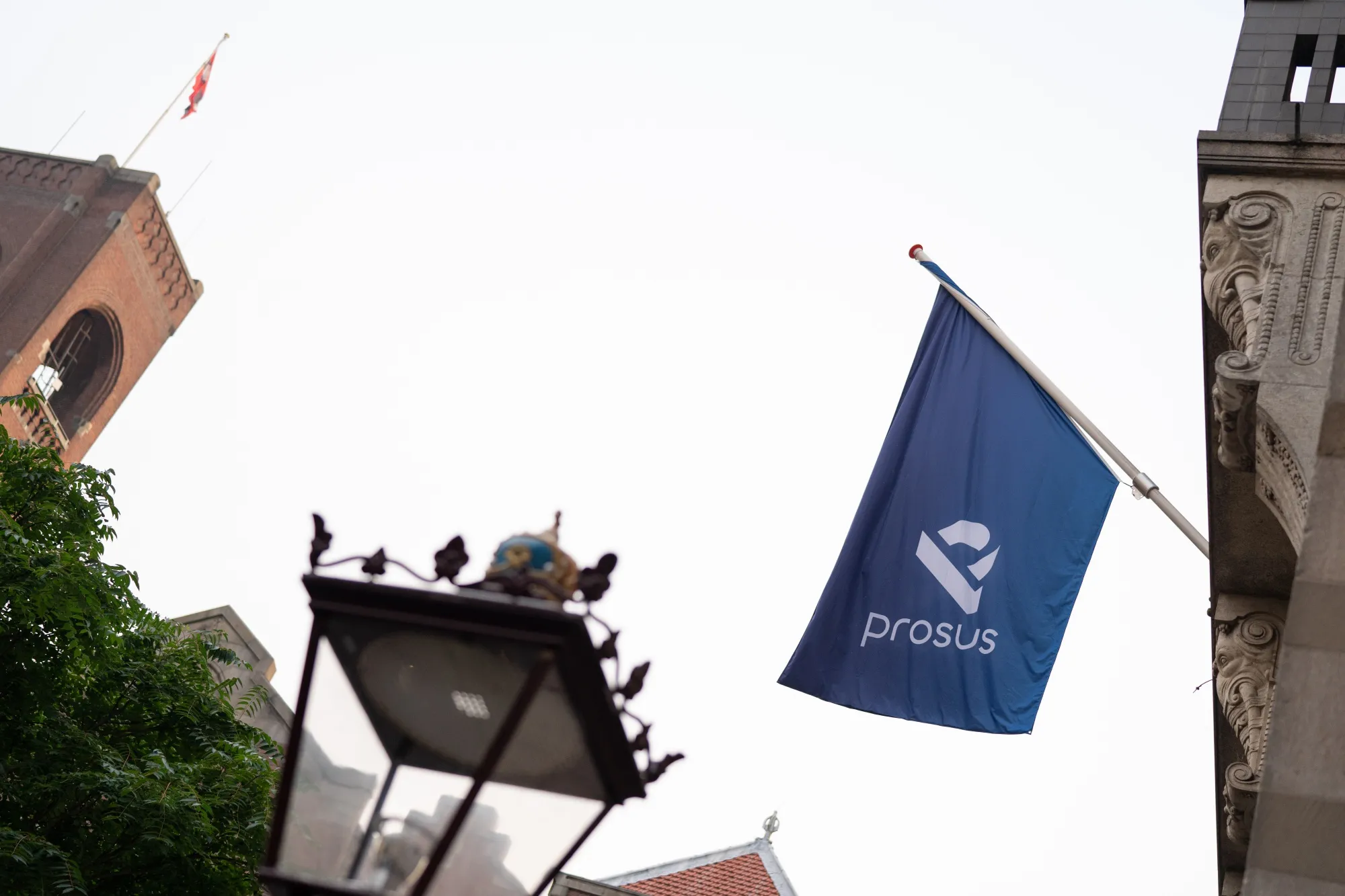 A Prosus flag is displayed outside the Amsterdam Stock Exchange in 2019.