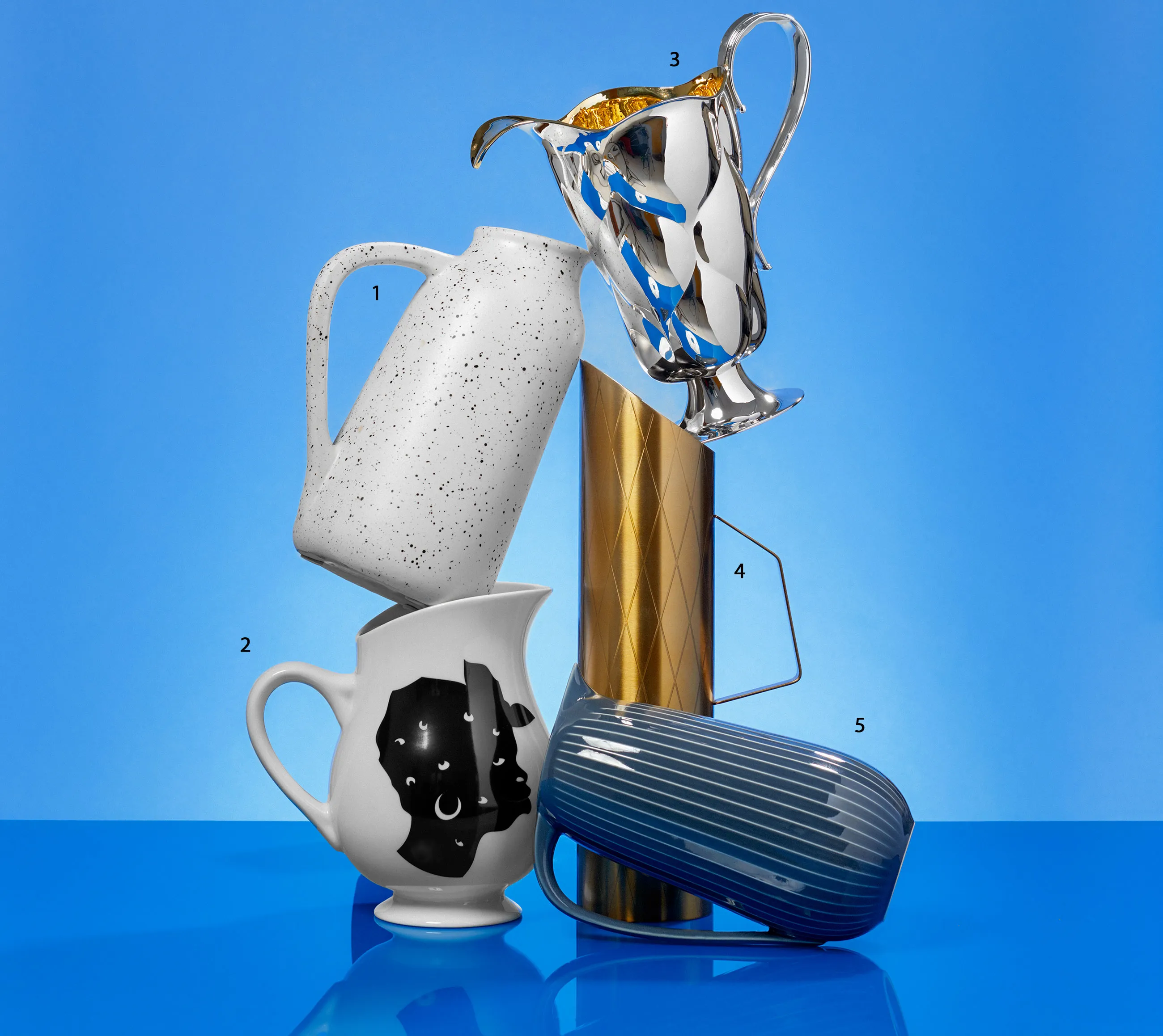Water pitchers from Target, Bernardaud, Wiener Silber, VonShef, and Kahler.