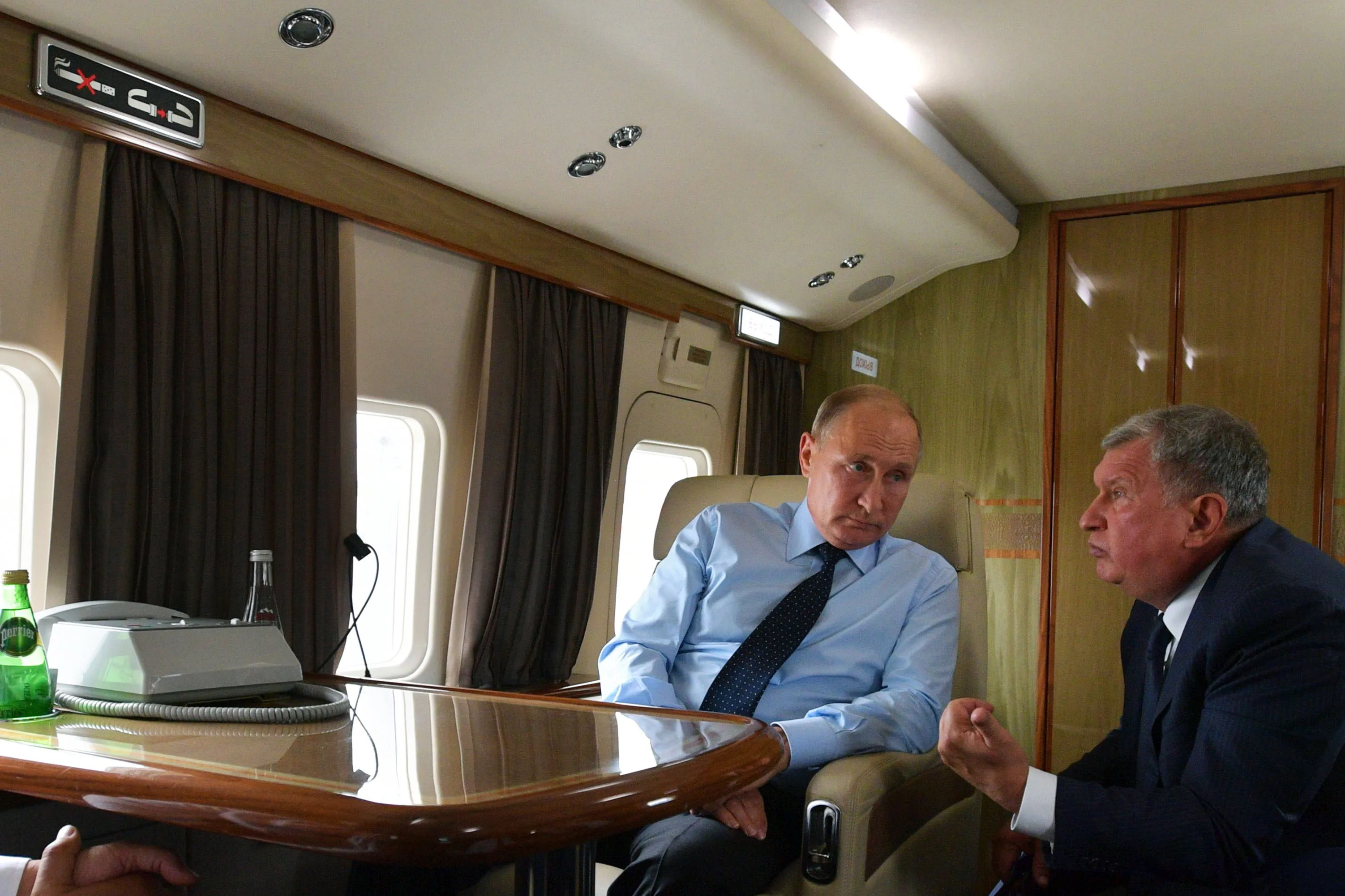 Vladimir Putin, left, with Rosneft Chief Executive Officer Igor Sechin.