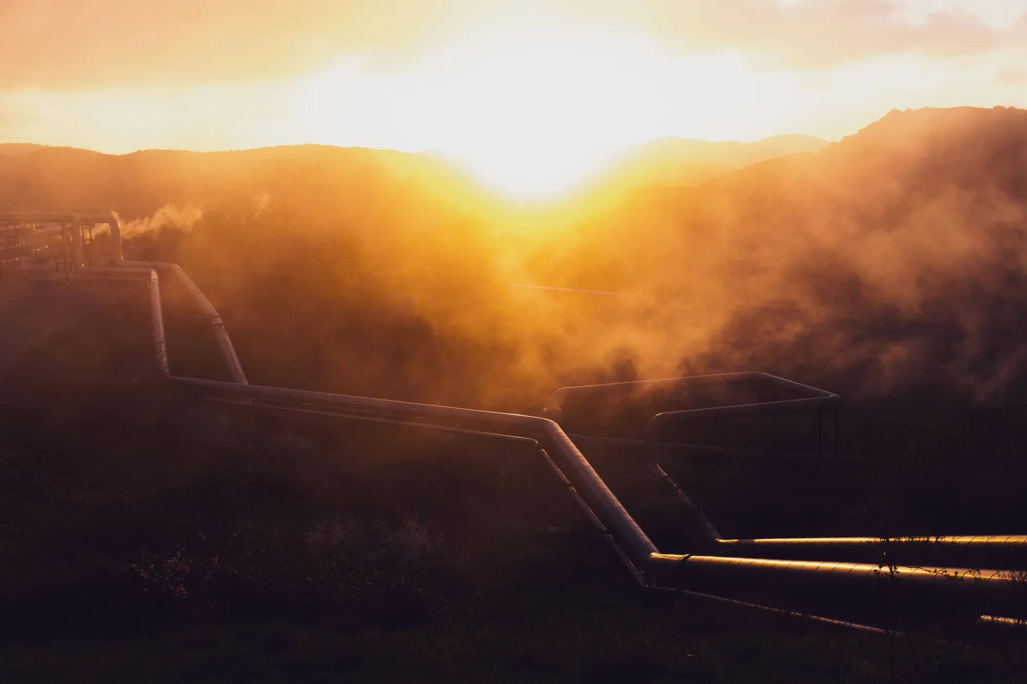 The sun sets near Enel Green Power’s geothermal power site in Larderello, Italy.