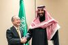 Masayoshi Son, left, shakes hands with Mohammed bin Salman in New York on March 27, 2018.