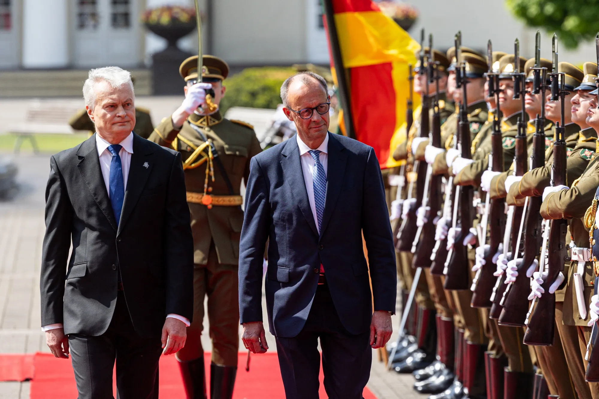 Friedrich Merz and Gitanas Nauseda, left, during a welcoming ceremony in Vilnius, Lithuania, on May 22.