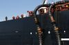 Oil pipes connect the oil tanker.