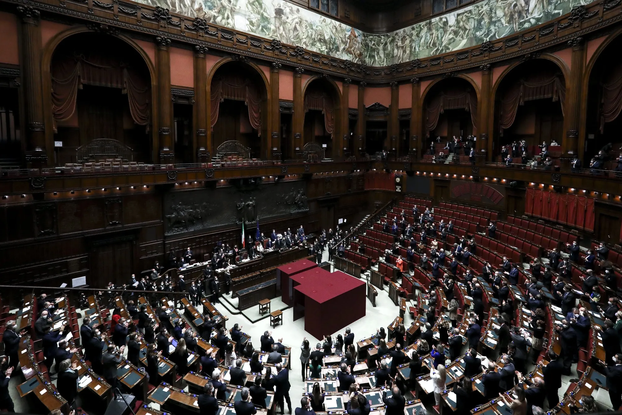 Italy's parliament applauding the&nbsp;final round of voting that resulted in Sergio Mattarella remaining president and Mario Draghi prime minister.