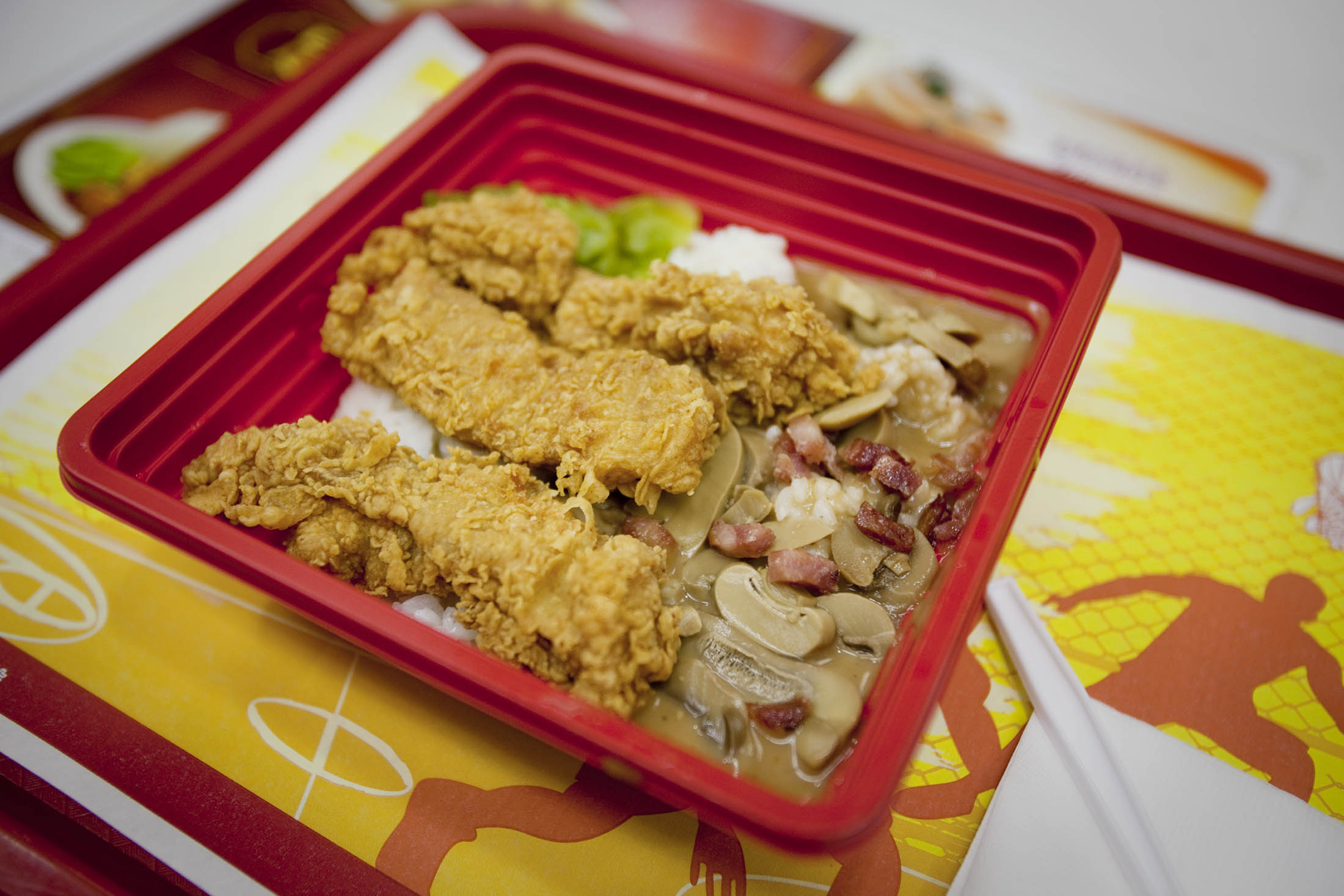 A bacon, mushroom and chicken rice dish is served to a customer at a KFC restaurant in Beijing.
