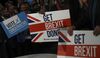 Supporters hold placards ahead of the official launch of the Conservative Party's general election campaign at the National Exhibition Centre in Birmingham, U.K., on Wednesday, Nov. 6, 2019. U.K. prime minister Boris Johnson said he'll be able to get his Brexit deal through Parliament in "a few weeks" if his Conservatives win a majority.