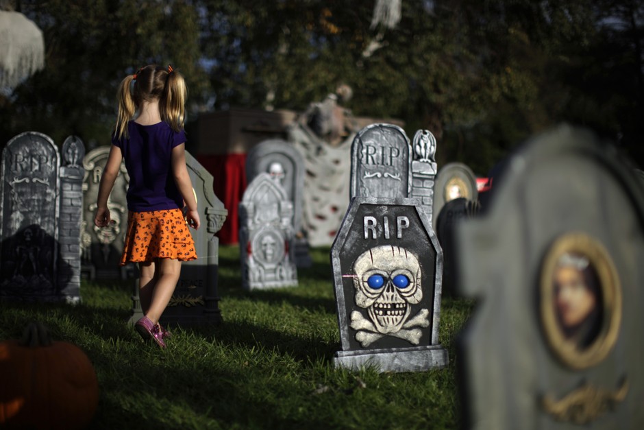 A Halloween lawn in Los Angeles. Some people save money by choosing to live near a cemetery every day, not just for Halloween.