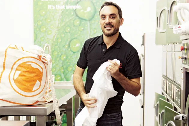Calleja hand-folds every item in the Manhattan branch of Eco Laundry. His previous job was doing PR for an investment bank