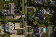 Hamptons Home Listings Surge To Record As Buyers Dither On Deals 