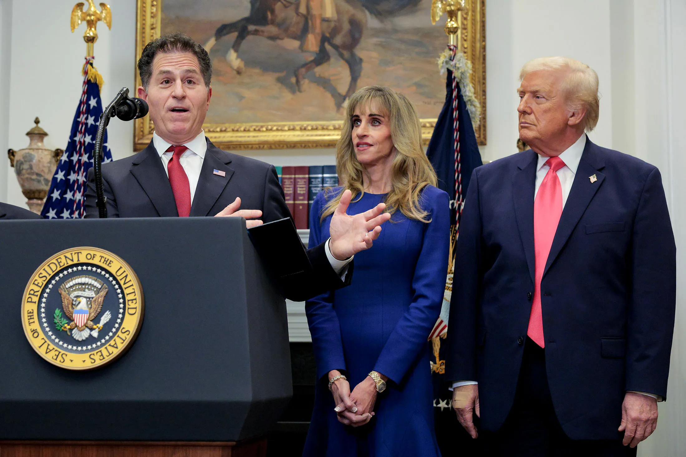 Michael Dell, left, speaking during an announcement with Susan Dell, center, and President Donald Trump at the White House on Dec. 2.