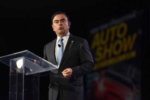 Carlos Ghosn speaks during the New York auto show.