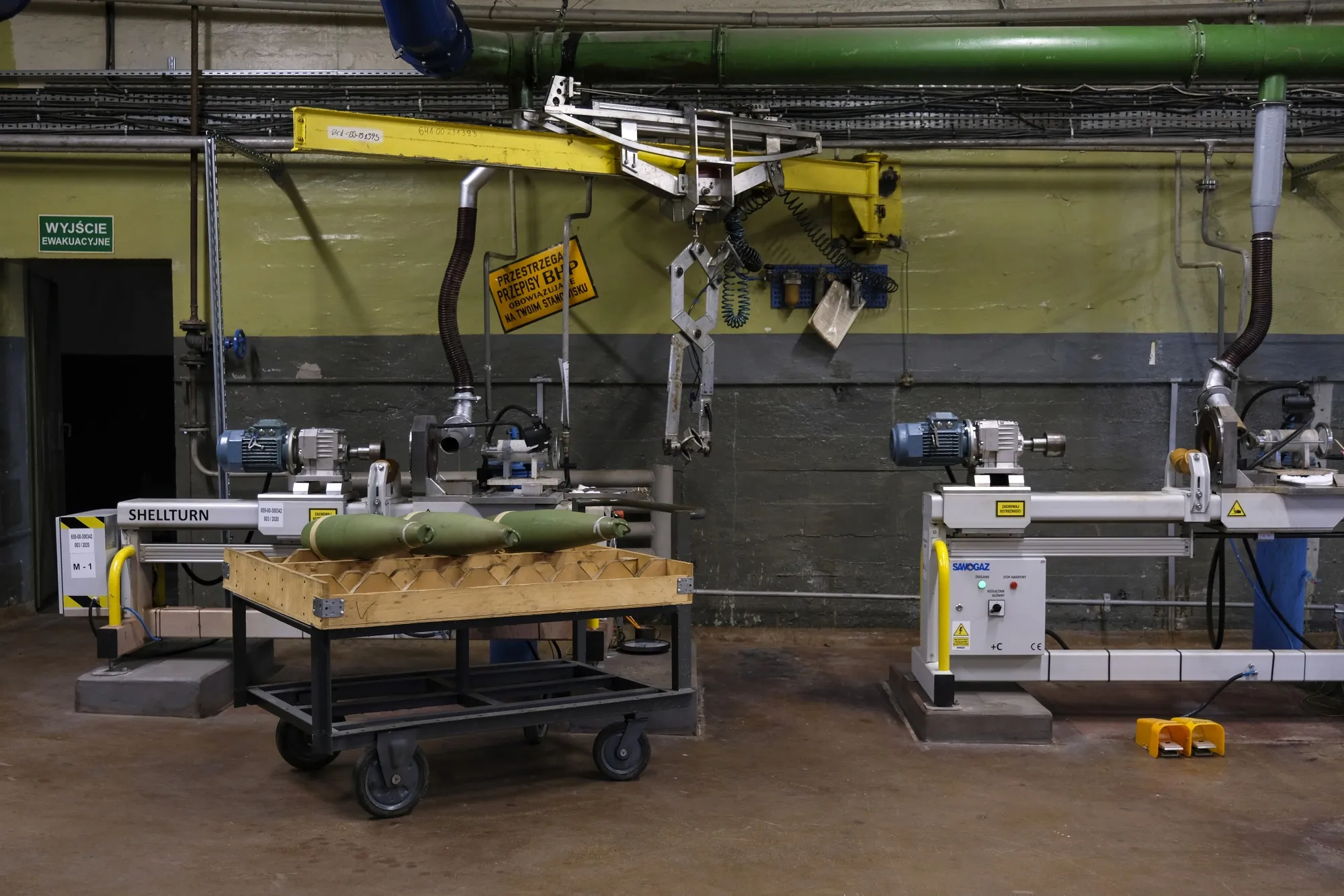 Three 155mm fragmentation and demolition shells on a cart at the Nitro-Chem SA ammunition factory in Bydgoszcz, Poland, in&nbsp;2023.&nbsp;