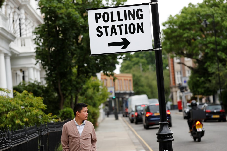 Sign pointing to a polling station in Kensington, West London, where Labour won an unprecedented victory.