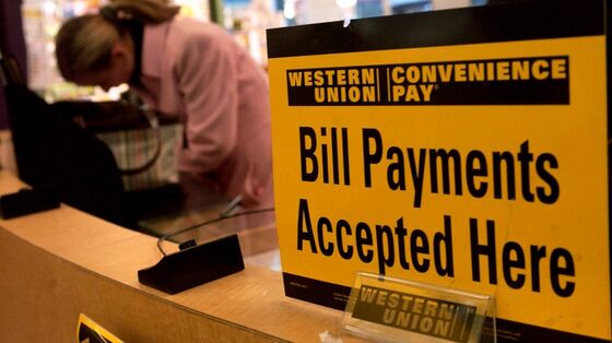 Western Union to Test Debit, Credit Card Offerings in Bank Push