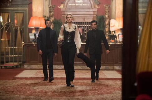 Victoria arrives at Rome's Grand Hotel Plaza, looking for trouble.