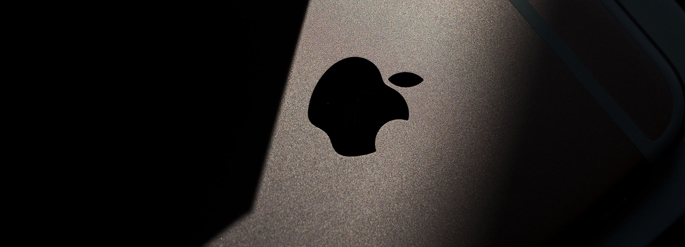 An Apple Inc. logo is seen on an iPhone 6s smartphone in an arranged photograph in Hong Kong, China, on Friday, Sept. 25, 2015. The latest models, following last year\'s hugely popular design overhaul that added bigger screens, may not match the success of previous releases, according to analysts.