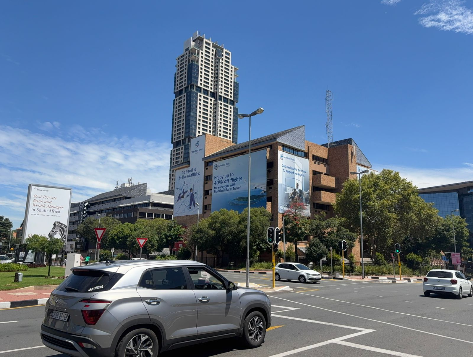 Billboards for rival private banks line routes to Johannesburg's affluent suburbs and commercial districts. Photographer: Prinesha Naidoo/Bloomberg