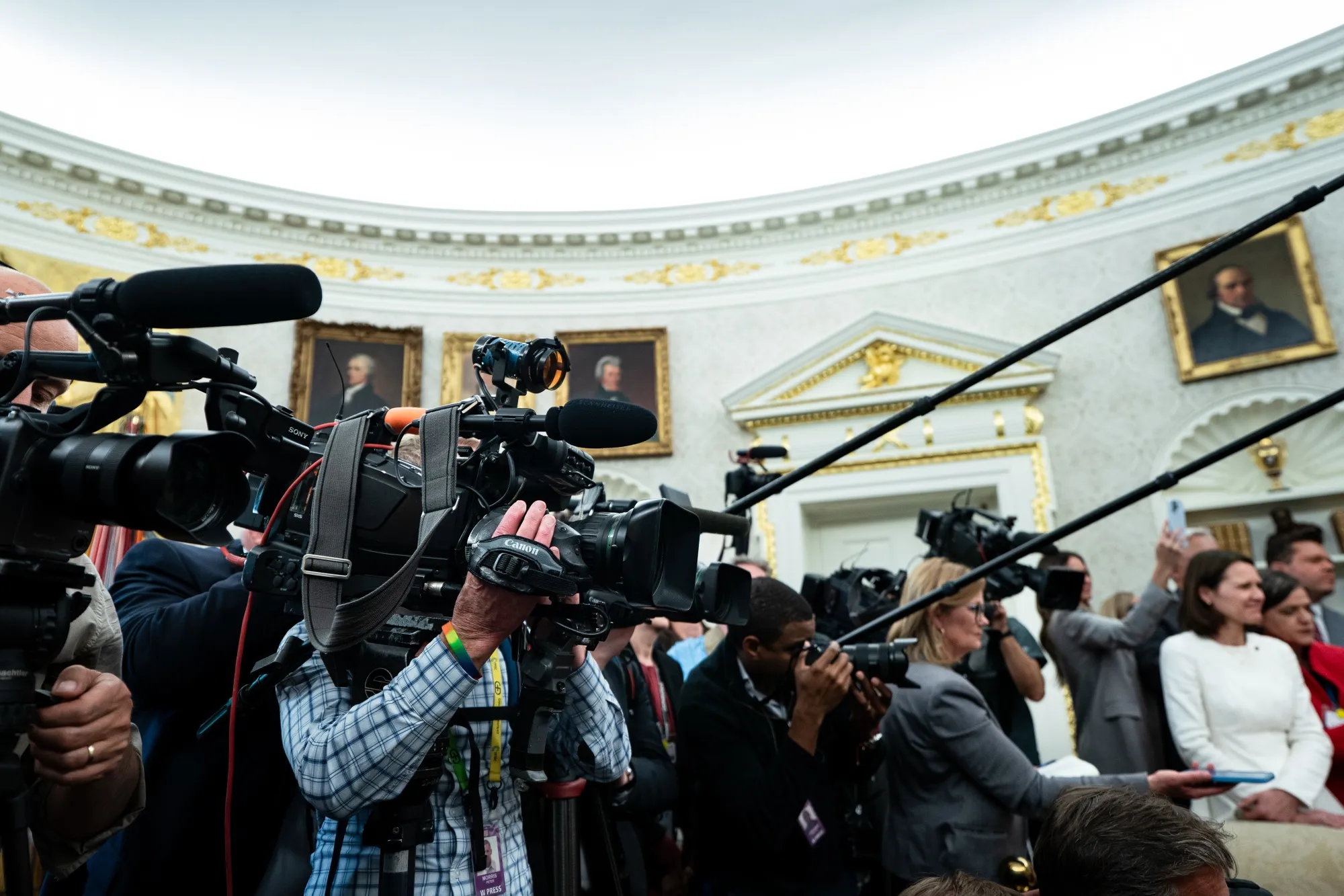 Members of the media&nbsp;in the Oval Office of the White House in Washington on April 24.