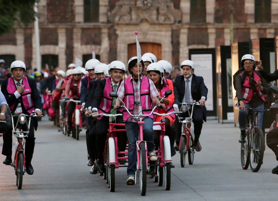 Mayors, including Paris mayor Anne Hidalgo, ride their bicycles ahead other mayors as they arrive at the C40 Mayors Summit in Mexico City.