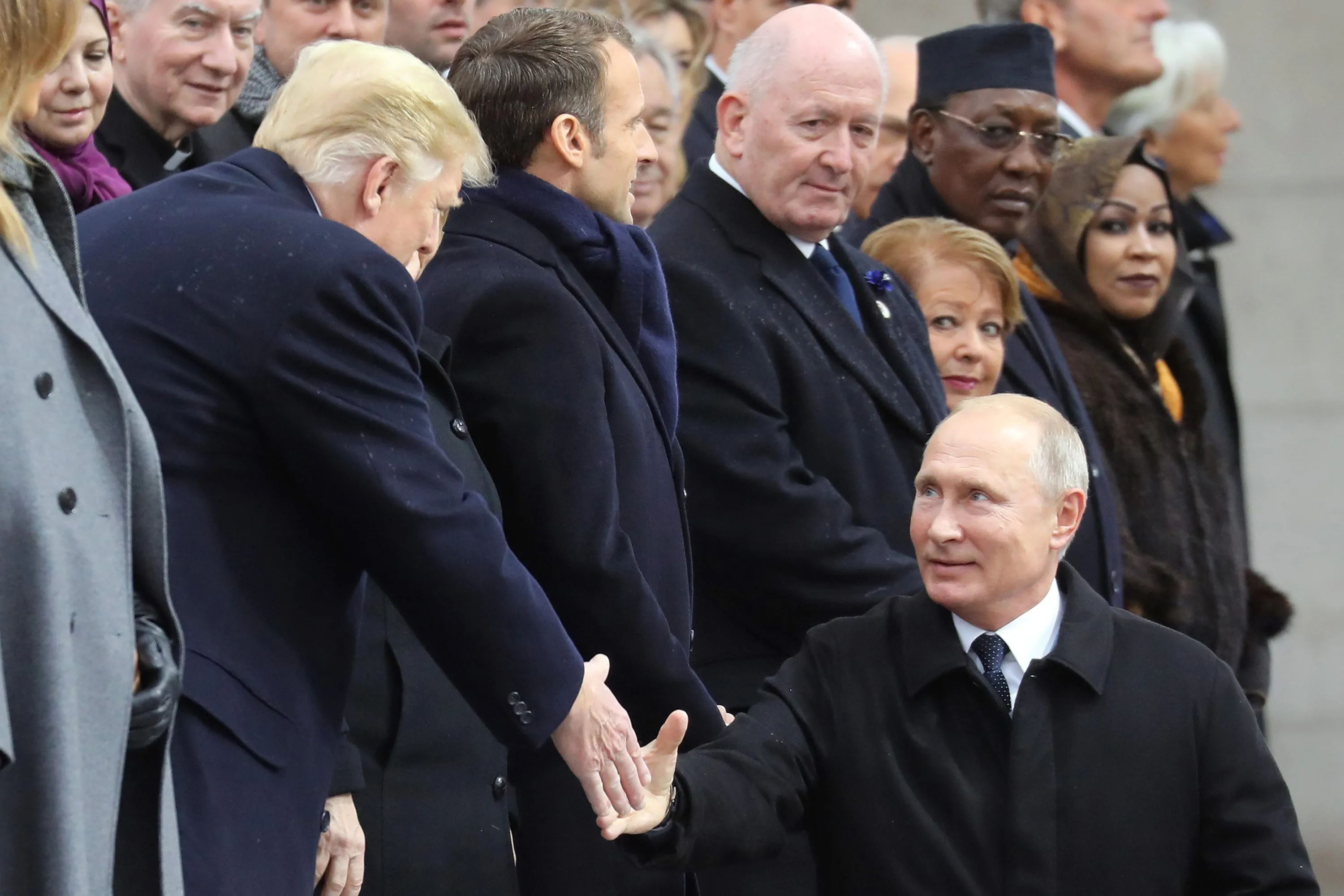 Vladimir Putin shakes hands with Donald Trump in Paris on Nov. 11.