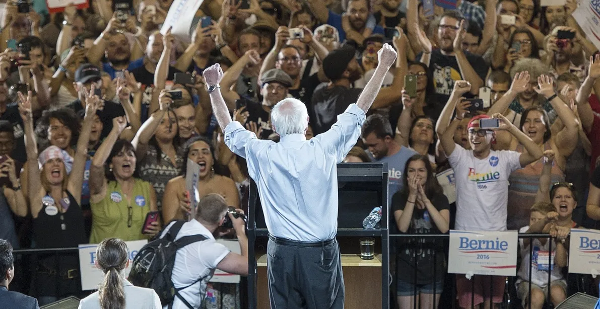 Democratic presidential candidate Sen. Bernie Sanders, I-Vt., lifts his arms in celebration as he speaks at a rally, Sunday, Aug. 9, 2015, at the Moda Center in Portland, Ore.
