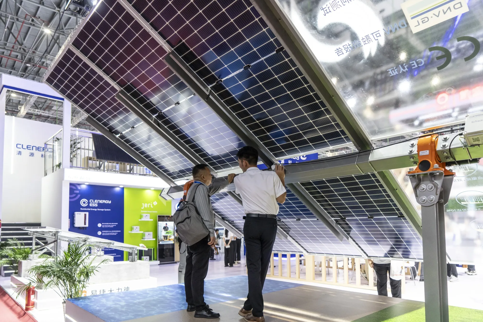 Solar panel products displayed at the Clenergy Technology’s booth at the International Photovoltaic Power Generation and Smart Energy Expo in Shanghai on June 13.