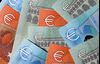 A selection of five, ten and 20 euro banknotes sit in this arranged photograph in London, U.K.
