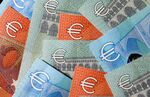 A selection of five, ten and 20 euro banknotes sit in this arranged photograph in London, U.K.