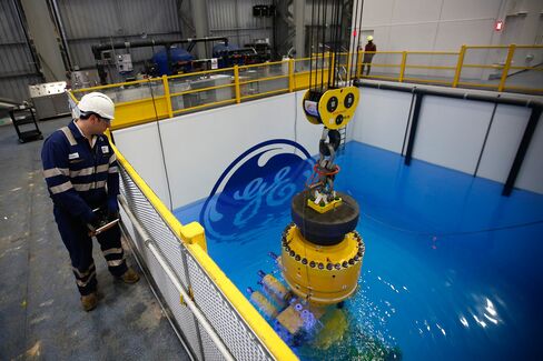 The company logo sits submerged in a testing pool at the General Electric Co. (GE) manufacturing plant in Montrose, U.K., on Wednesday, Dec. 11, 2013.