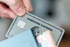 Branding on platinum AmEx card in a wallet