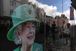 A photograph of Queen Elizabeth II in a shop window near Windsor Castle following her death.