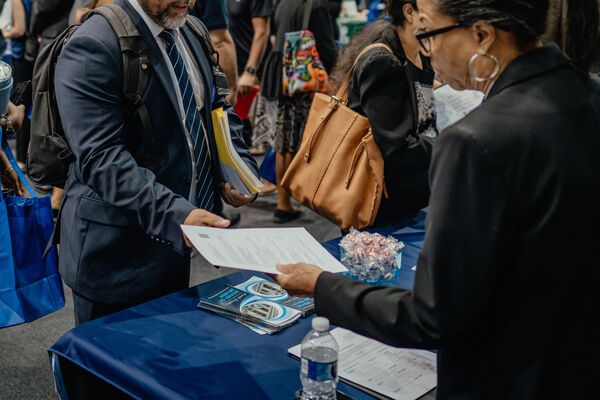 Recruiters and job seekers during a career fair in Chicago