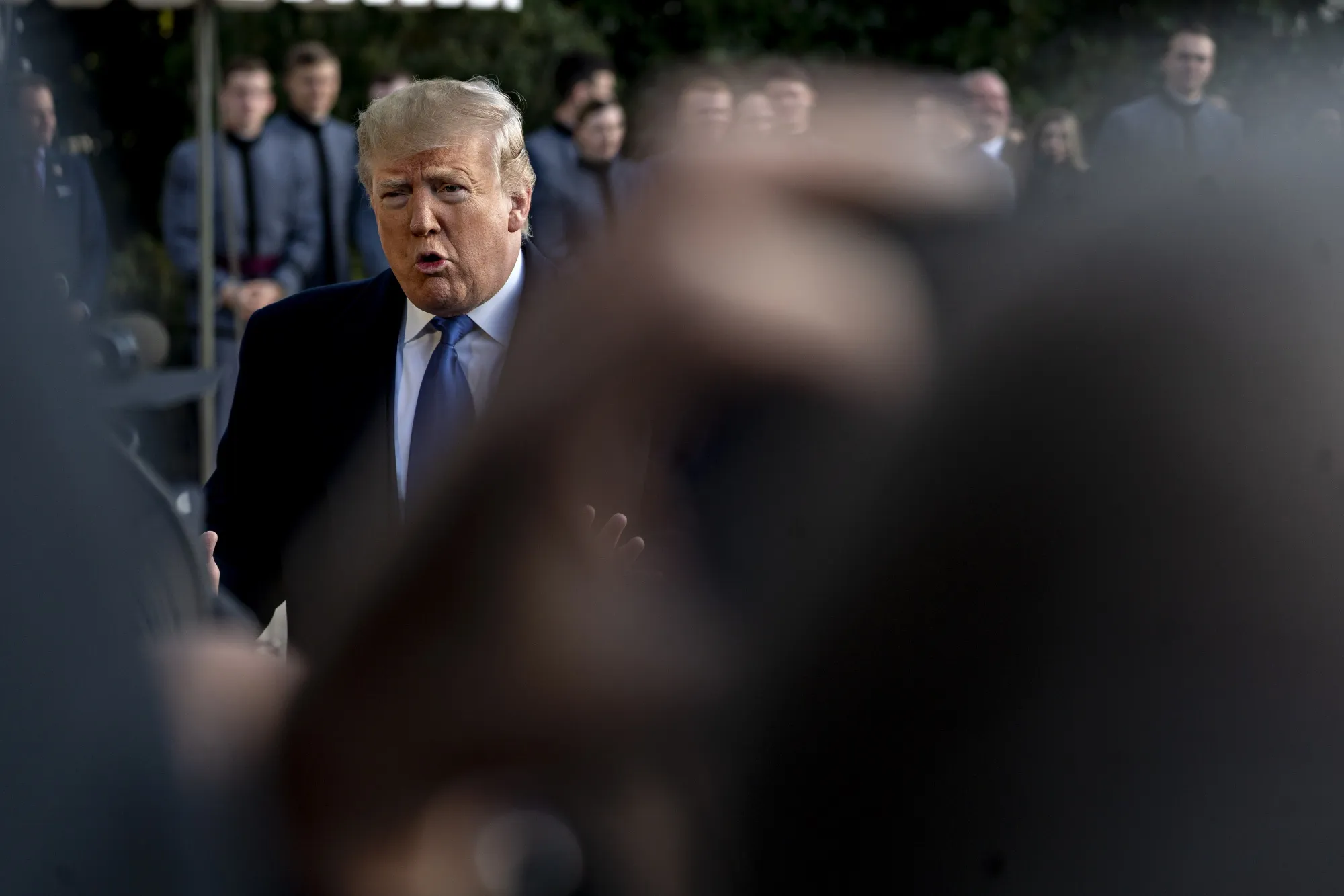Donald Trump speaks to members of the media before boarding Marine One on the South Lawn of the White House on Nov. 8.