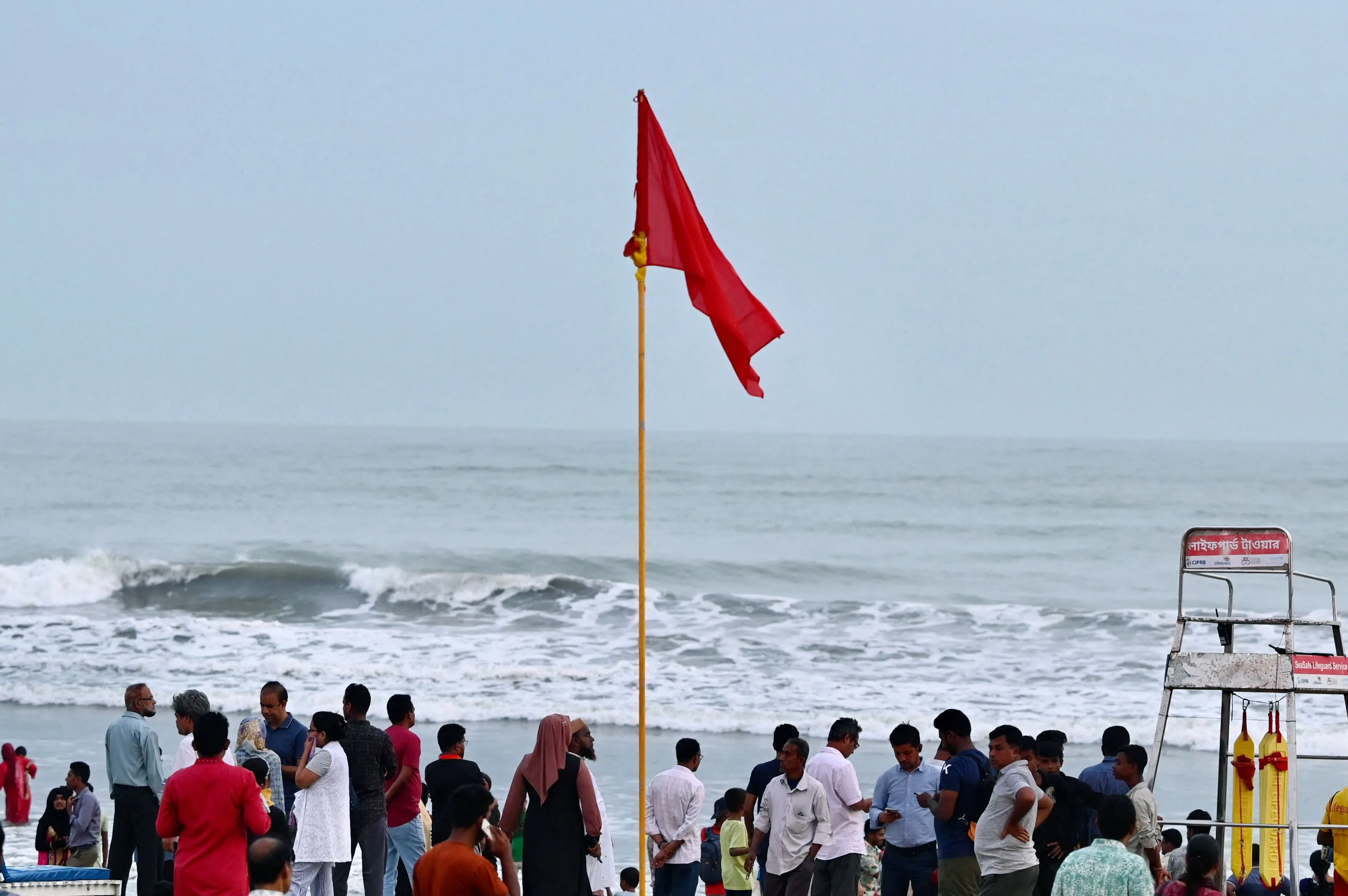 A red flag is hoisted on a beach in Cox’s Bazar in Bangladesh on May 12.