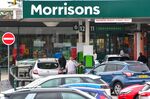Customers use a fuel station at a&nbsp;Morrisons supermarket&nbsp;in Bradford, UK.