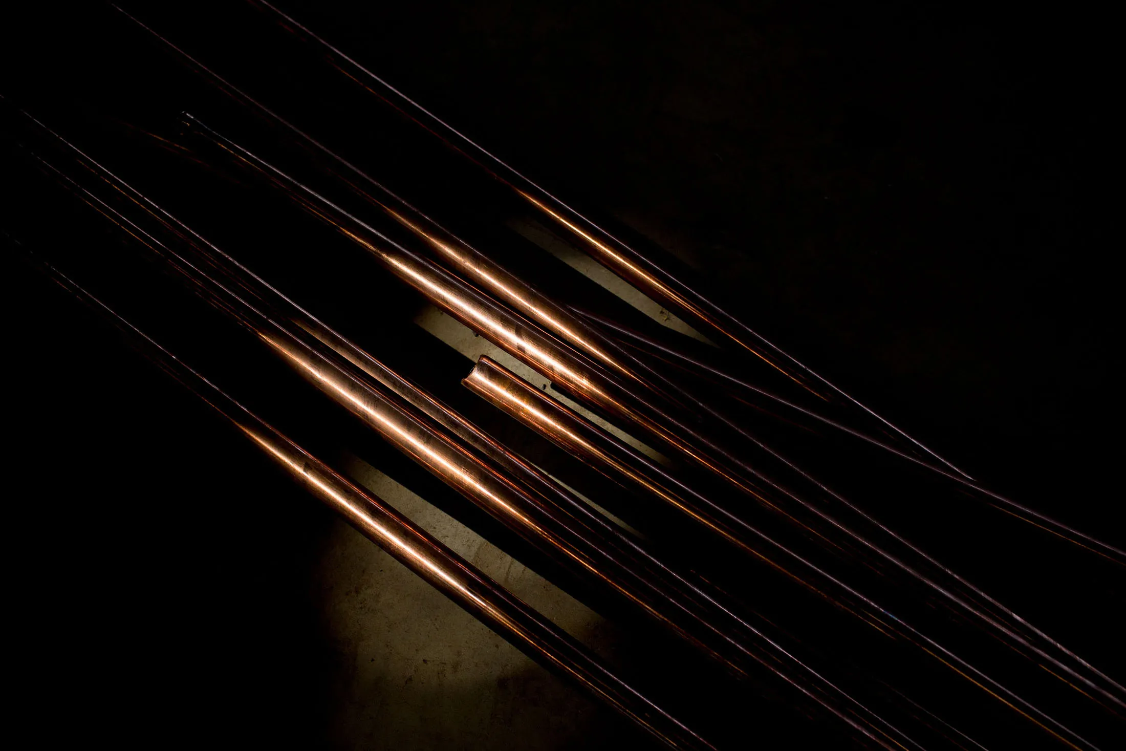 Copper tubes lay on the floor at the Kamani Tubes Ltd. plant in Wada, Maharashtra, India, on Saturday, Nov. 3, 2012. India's manufacturing growth accelerated in October for the first time in four months, a private survey showed, adding to signs that the worst of Asia's economic slowdown may have passed.