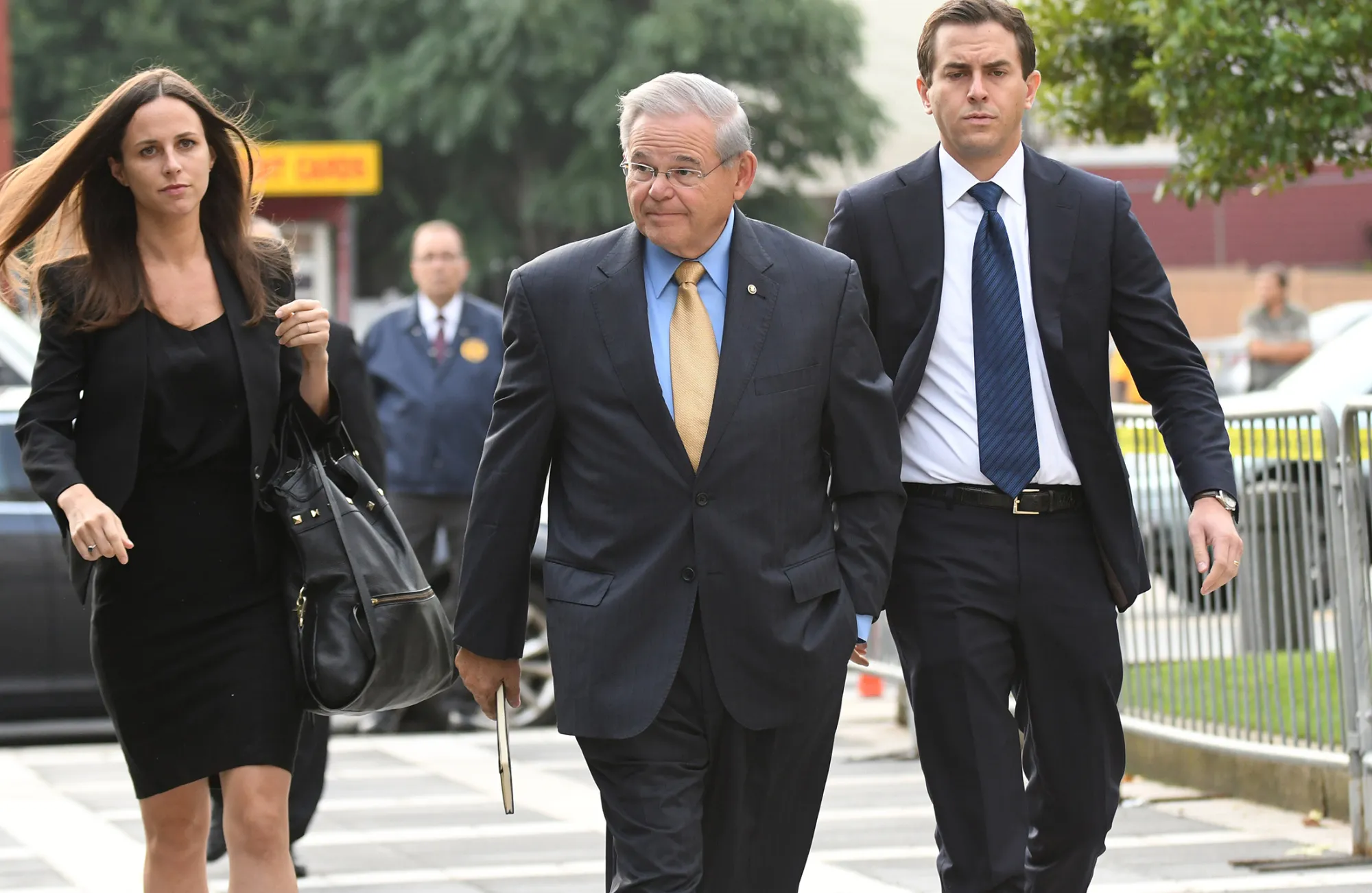 Senator Robert Menendez, a Democrat from New Jersey, center, arrives at federal court with his children Alicia Menendez, left, and Robert Jr. Menendez in Newark, New Jersey, on Sept. 6, 2017.
