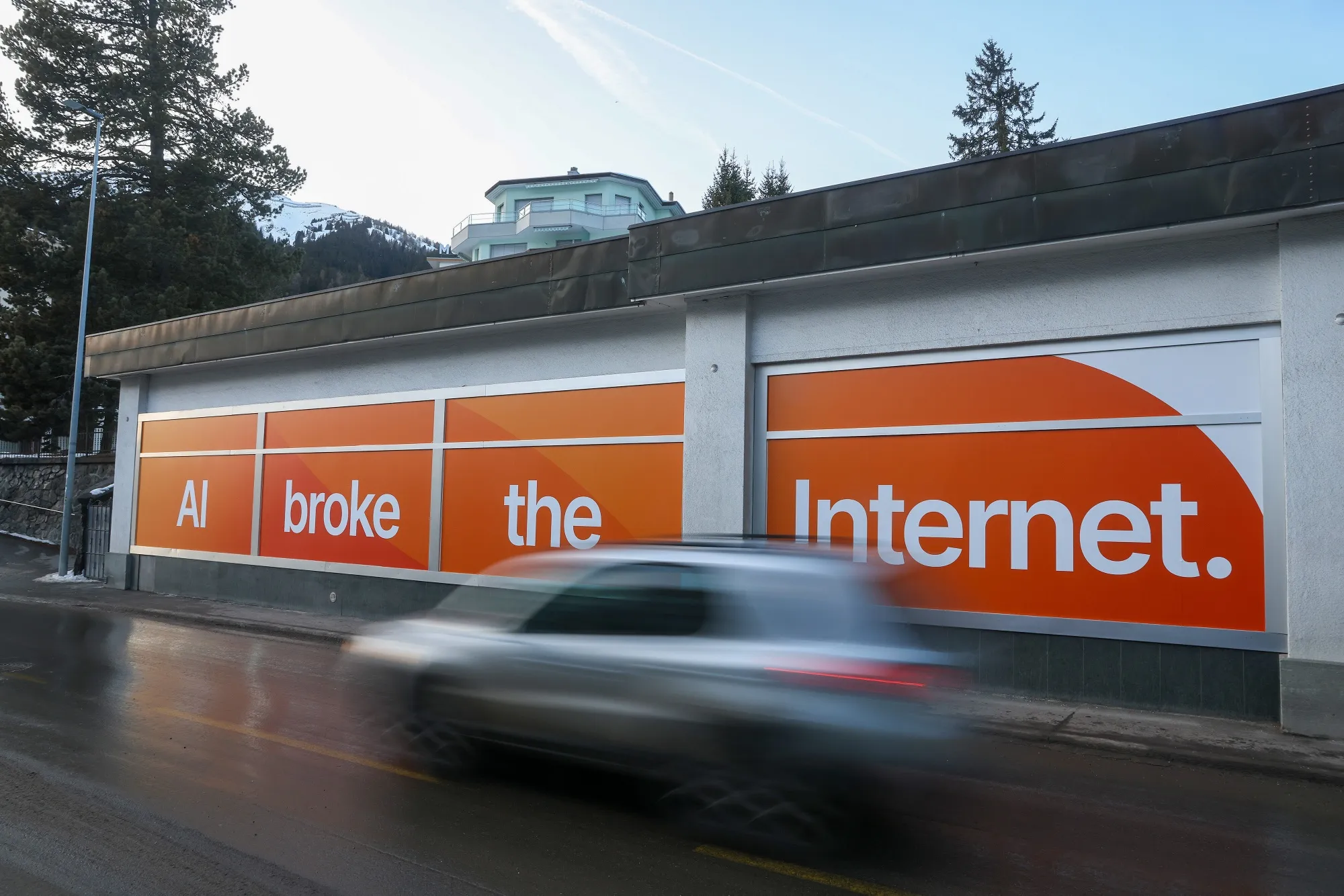 An “AI Broke The Internet” slogan at the Cloudflare house pavilion ahead of the World Economic Forum (WEF) annual meeting in Davos, Switzerland, on Sunday, Jan 18, 2026. T