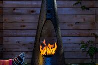 relates to The Fire Pits, Tents, and Gear to Warm You Up Outdoors This Winter